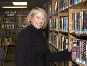 patron-in-stacks1 Patron at bookshelf